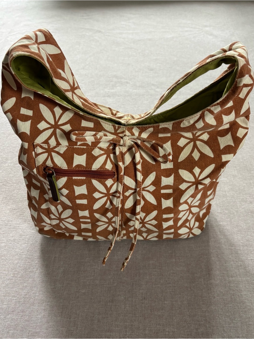 Esprit vintage rust orange canvas hobo bag with ribbon bow tie.